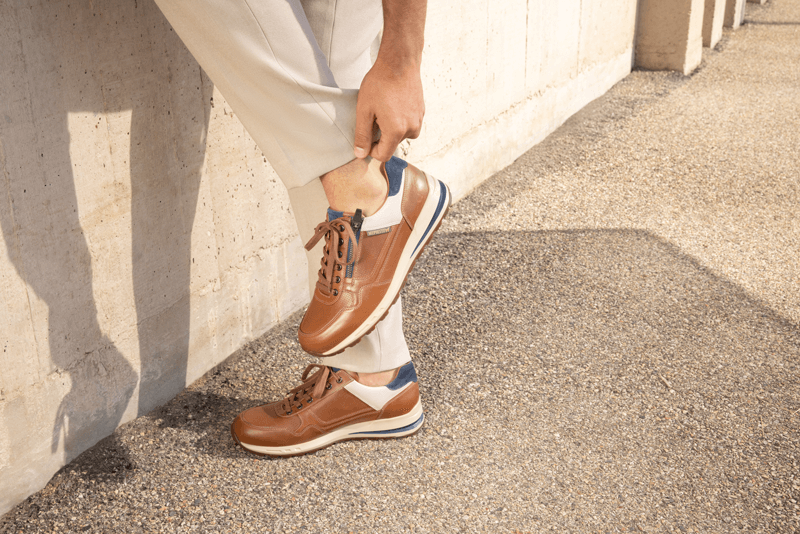 Man wearing stylish brown Mephisto boots
